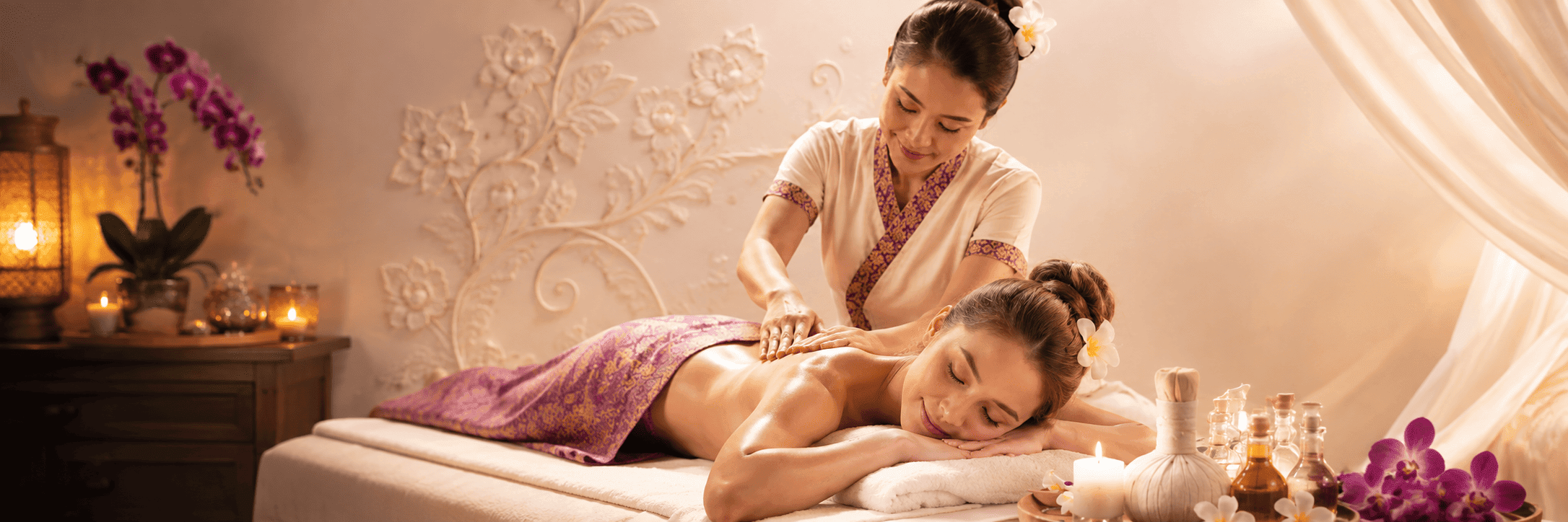 A therapist providing a relaxing massage in a softly lit spa room